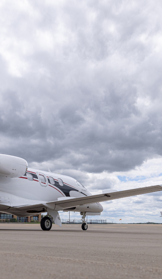 Plane taking off on a cloudy day