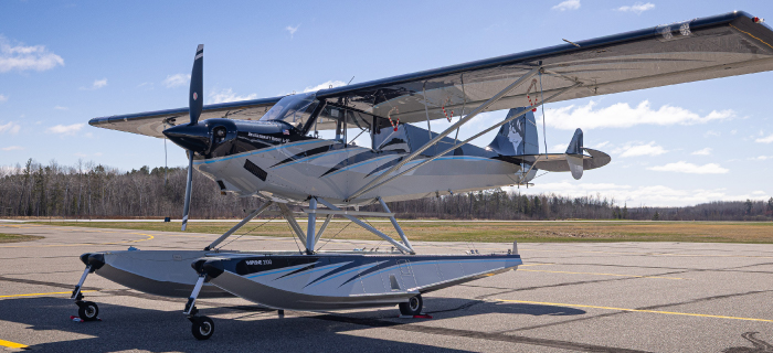 Plane on the runway during the midday sun