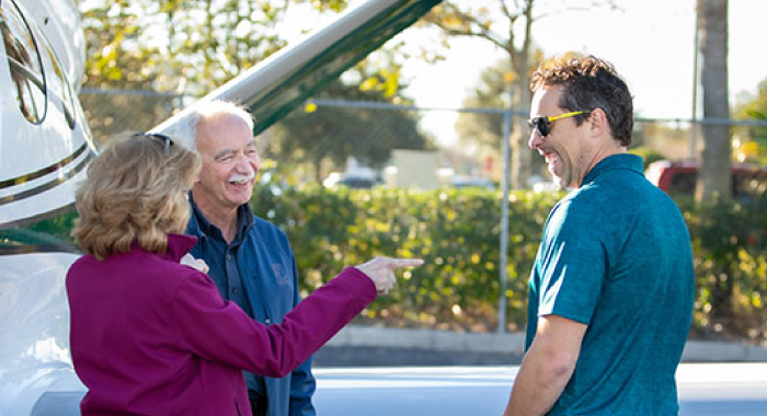 Couple discussing buying a plane